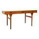 Nanna Ditzel, 1923-2005: Skrivebord i teak med tre skuffer. Flot stand. Senere 
låsebeslag. H: 74,5cm. Plade: 75x145cm