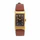 Patek Philippe Tegolino armbåndsur i 18kt guld udført i 1940erne. Skive betegnet "Patek Philippe & Co Geneve". Kassemål: 20x35mm (eksl. horn)