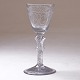 Nøstetangen Chrystal Desert glas prydet med kartouche med monogram "PGC" og drikkevers. Nøstetangen ca. år  1760. H: 14cm